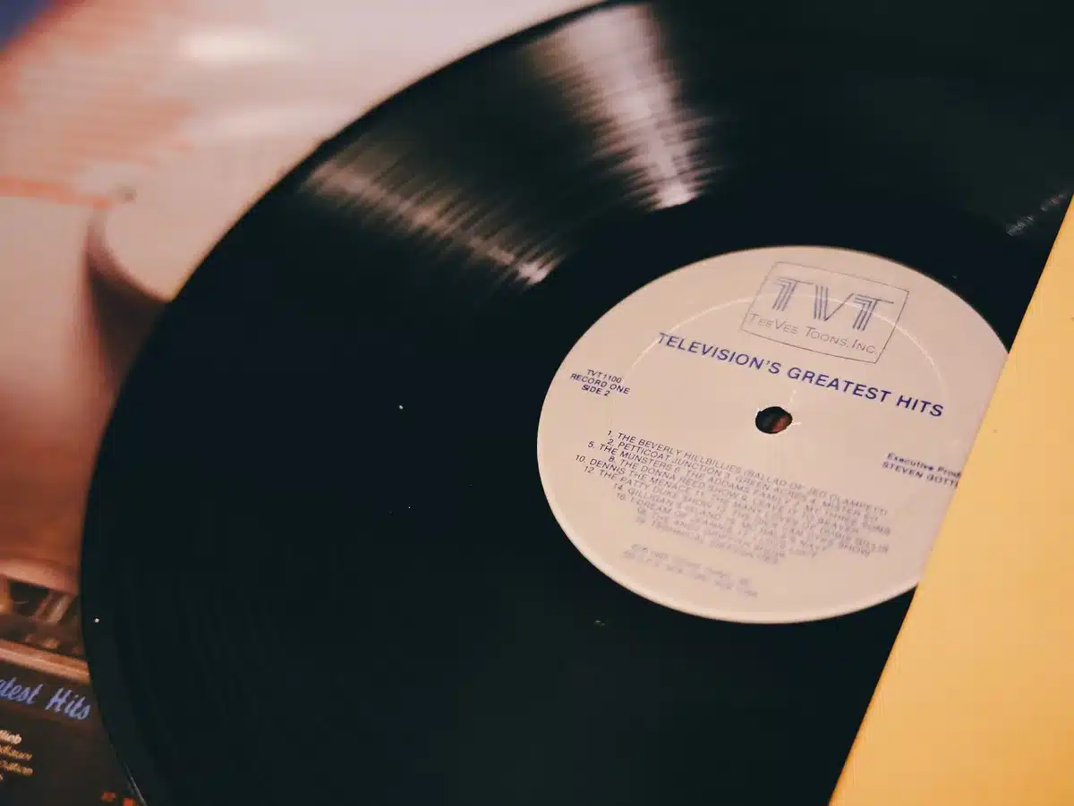 Vinyl record and CD album covers displayed together