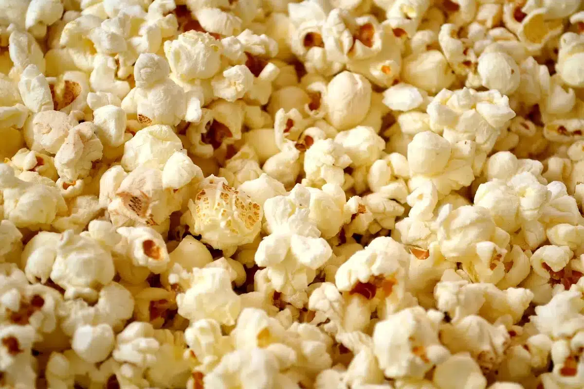 Audience watching a film's post-credits scene in a cinema