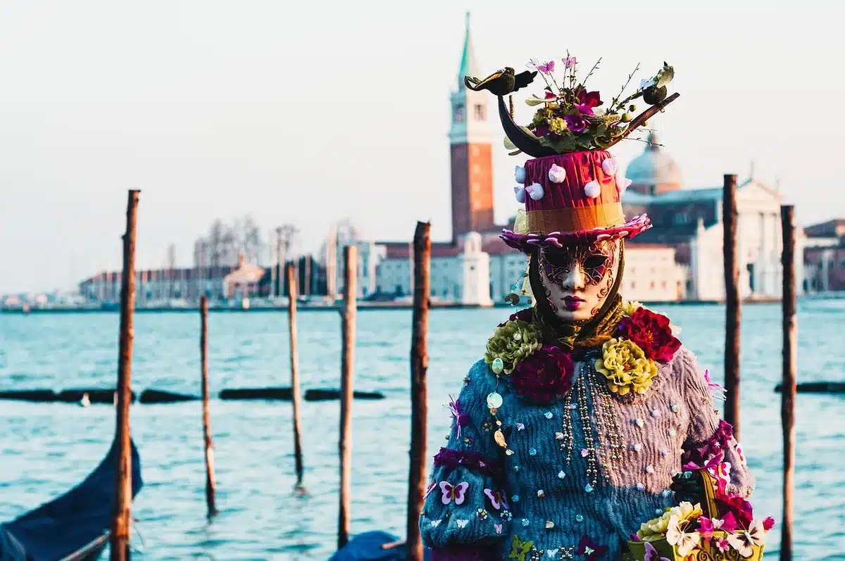 Scene from Venice festival screening with film stills displayed